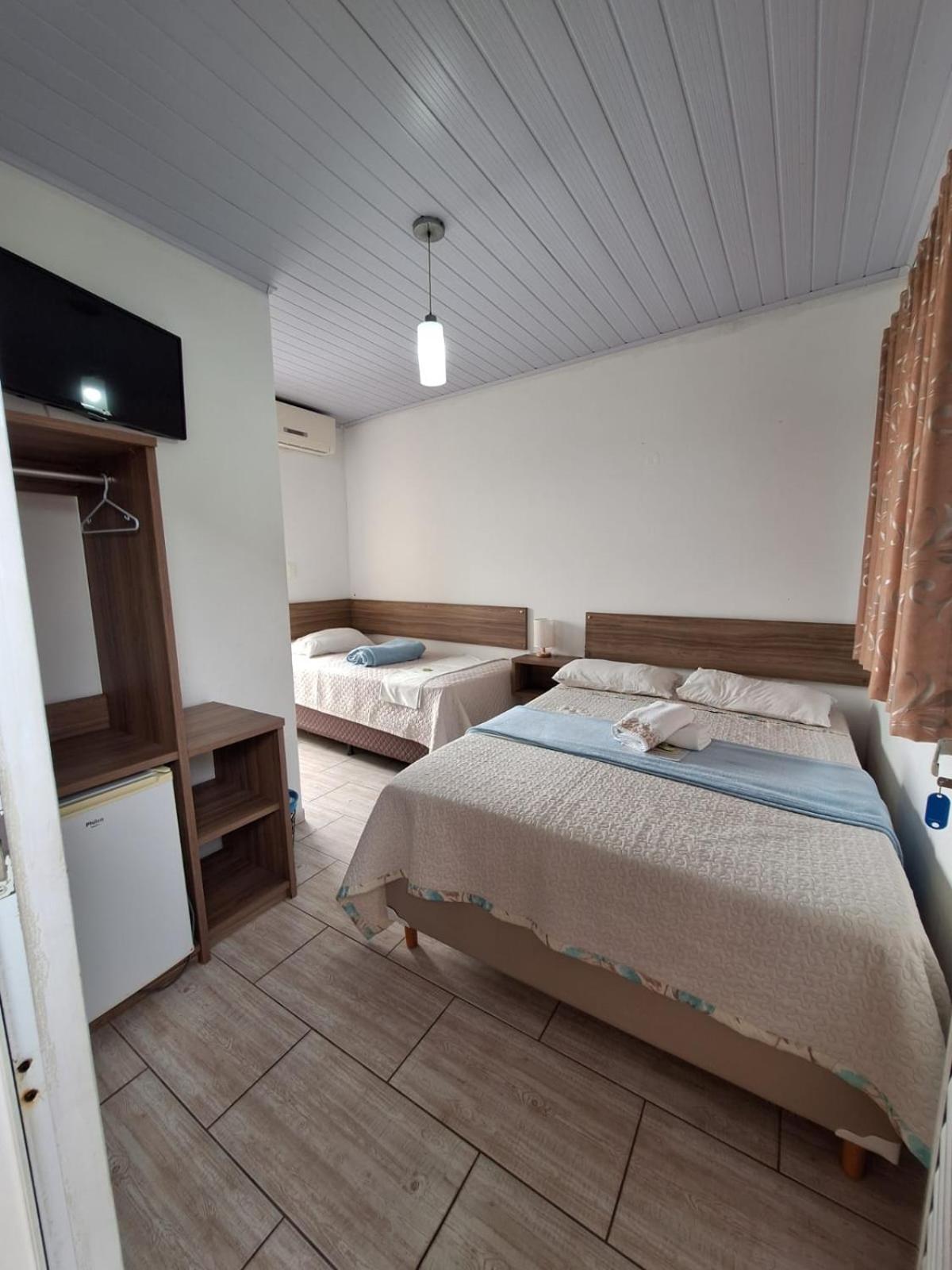 Quarto Triplo com Terraço